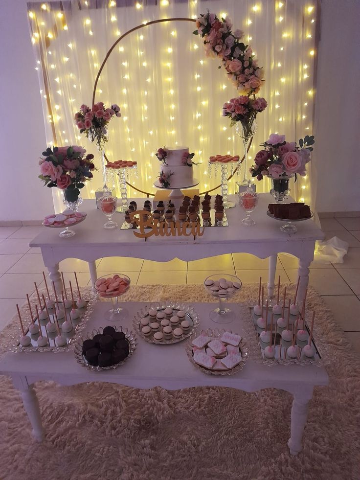Candy bar con flores y aro iluminado